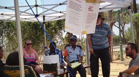Ebola virus checkpoint screening at Botswana / Zimbabwe border crossing (Africa) Stock Footage 42260979