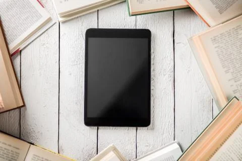 Ebook Reader with Books Stock Photos
