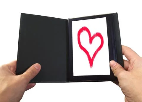 EBook reader with a heart on the screen Stock Photos