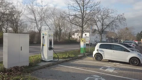 ECar Charging at Charging Station Stock Footage 166641371