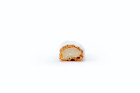Eclair with cream filling in the cut isolate on a white surface Stock Photos
