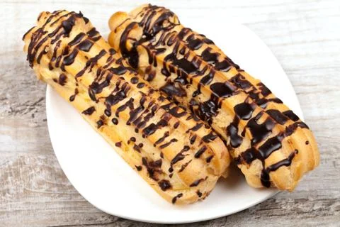 Eclair with custard 스톡 사진