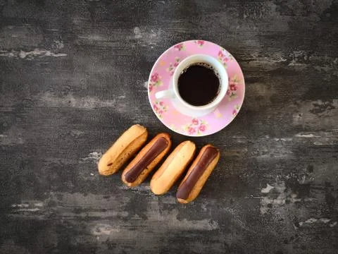 Eclair Puffs dessert on the table Stock Photos