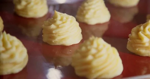 Eclairs are prepared in the oven, Time-lapse, 4k Stock Footage 69943319
