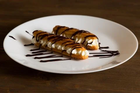 Eclairs with a delicate cream inside Stock-Fotos