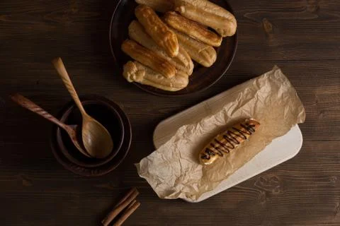 Eclairs with a delicate cream inside Stock Photos