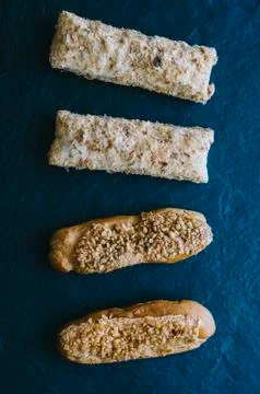 Eclairs On Table Stock Photos