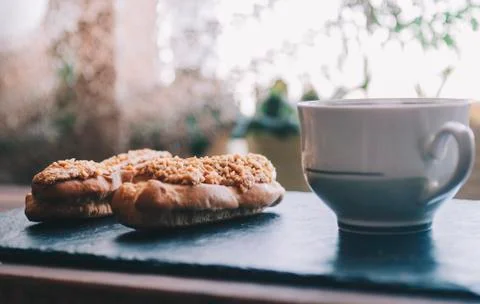 Eclairs On Table Stock Photos