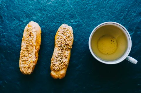 Eclairs On Table Stock Photos