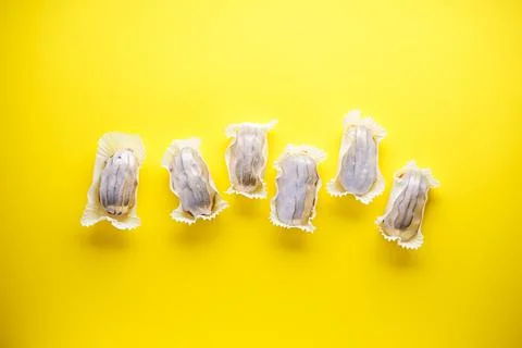 Eclairs on a yellow background flat lay. French dessert Home Eclairs Stock Photos
