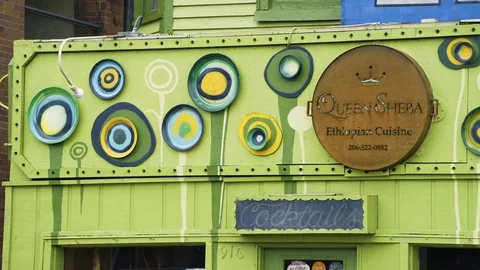 Eclectic building in Seattle with lime paint and signs Stock Footage 73492863