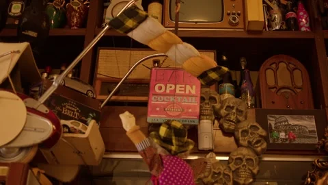 Eclectic collection of vintage objects and curiosities decorating a traditional Stock Footage 337740380