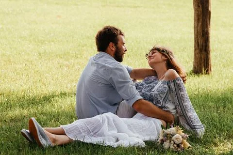 Eclectic rustic wedding couple. Intimate ceremony at backyard Stock Photos