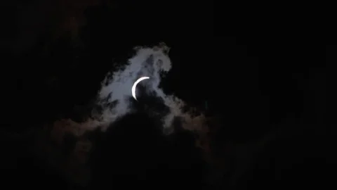 Eclipse with clouds - COLORED Stock Footage 84194455