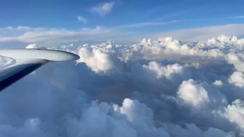 Eclipse Jet flying over the clouds on bright sunny day. Stock Footage 288021728