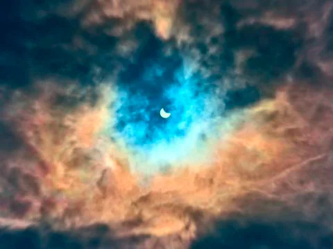Eclipse of the sun in the afternoon clouds Osred 20.032015 Stock Photos