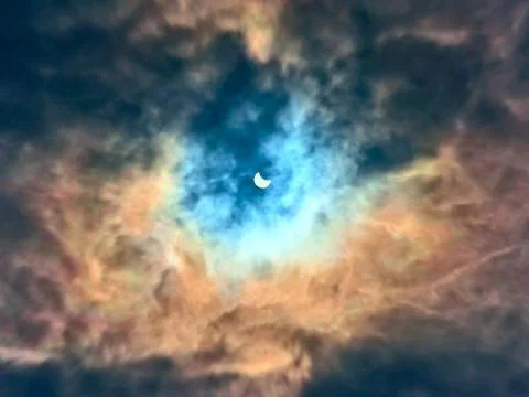 Eclipse of the sun in the afternoon clouds Osred 20.032015 eclipse of the ... Stock Photos