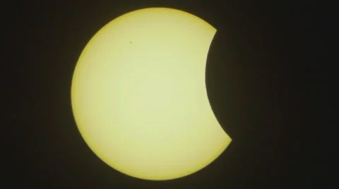 The eclipse of the sun, real time. Close up view. Atmosphere distortion is seen Stock Footage 48330256