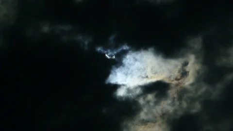 The eclipse of the sun in the sky. The eclipse through the cloud Stock Footage
