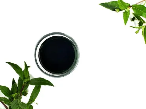 Eclipta Alba or False Daisy plant extract Stock Photos