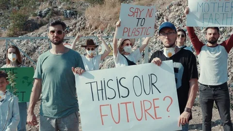 Eco activists with invocatory posters calling on for nature conservation in Stock Footage 113927258