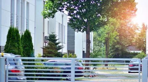 Eco architecture. Green tree and apartment building. Stock Photos