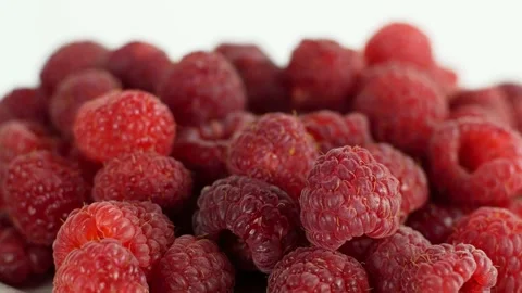 Eco bright colorful berry raspberry rotates 360 on a white background. Close-up Video stock 147184946