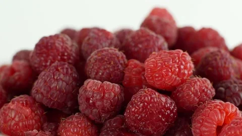 Eco bright colorful berry raspberry rotates 360 on a white background. Close-up Video stock 147185045