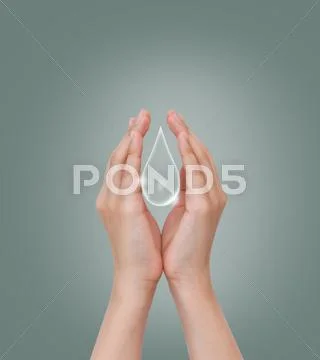 Eco concept : hand hold water drop with tree inside Stock Illustration