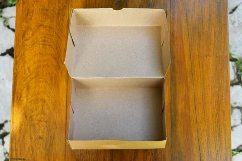Eco friendly disposable cardboard packaging for food in brown color Stock Photos