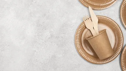 Eco friendly disposable tableware and cup top view copy space Stock Photos