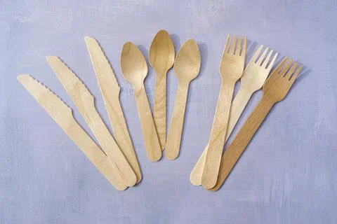 Eco Friendly Disposable tableware from natural materials. Wooden cutlery on n Stock Photos