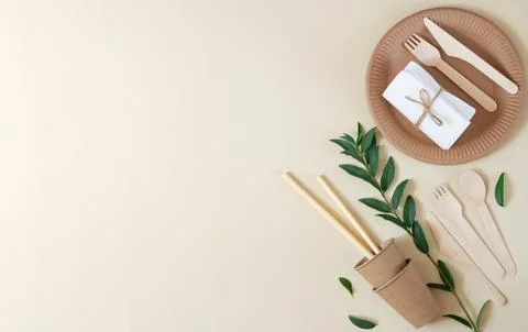 Eco-friendly disposable tableware top view with copy space. Nature conservati Stock Photos