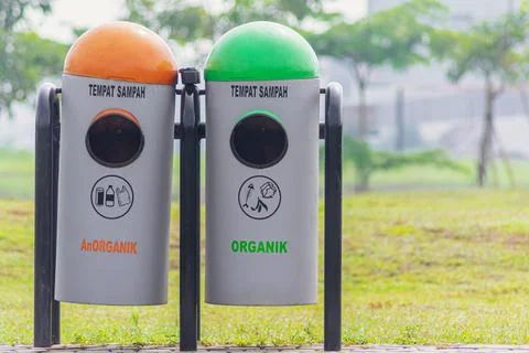 Eco friendly garbage or trash bin on the public city park Stock Photos
