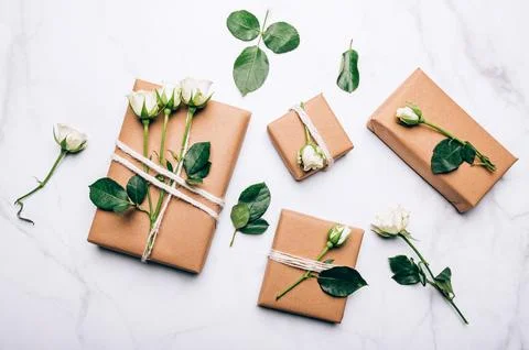 Eco friendly gift wrapped in brown paper Stock Photos