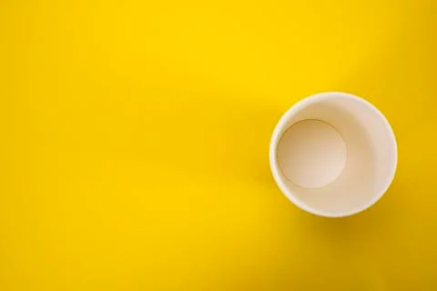 Eco-friendly glasses for drinking tea and coffee on a yellow background zero  Stock Photos