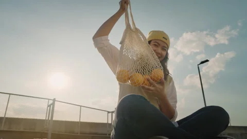 Eco friendly go green net zero using mesh tote bag. Save the earth. Stock Footage 231746972