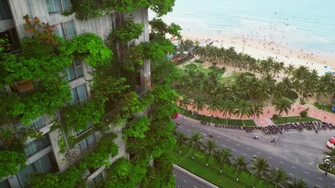 Eco friendly green building with vertical garden near ocean, city harmony Vídeos de archivo 308081869