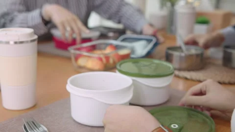 Eco friendly lunchbox taking lunchtime at go green workplace organization. 스톡 동영상 250298907