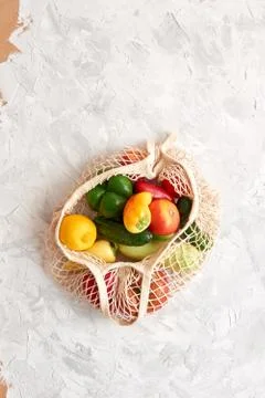 Eco friendly mesh bag with fruit and veggies. Top view. No plastic Stock Photos