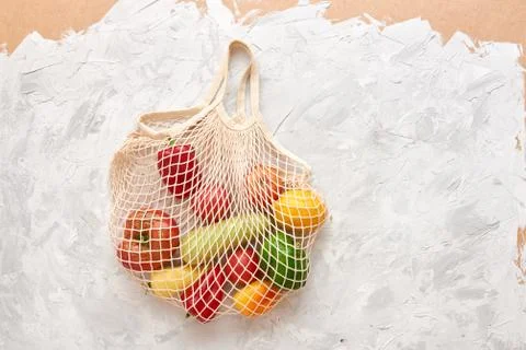 Eco friendly mesh bag with fruit and veggies. Top view. No plastic Stock Photos