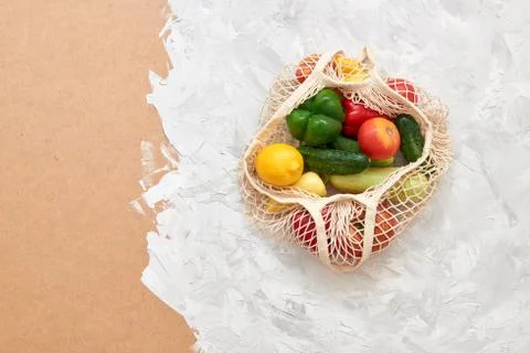 Eco friendly mesh bag with fruit and veggies. Top view. No plastic Stock Photos