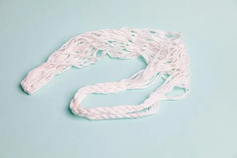 Eco-friendly mesh on a blue background. Foto stock