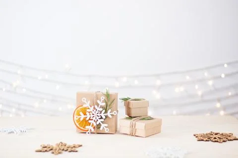 Eco friendly packaging gifts in craft paper on wooden table. Zero waste Chris Stock Photos