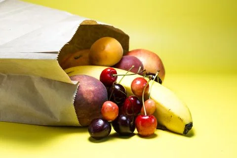 Eco-friendly packaging with a set of fresh fruits close-up Stock Photos