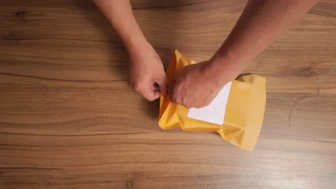 Eco Friendly Parcel Packing Hands Using Recycled Paper for Shipping 库存影片 327902284