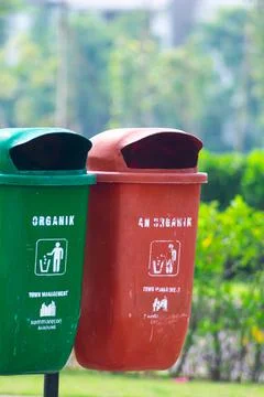 Eco Friendly plastic garbage or trash bin on public city park Stock Photos