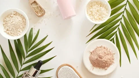 Eco friendly products on white background with green palm leaves. Bottle with Stock Footage 228804956