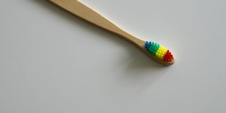 Eco-friendly Rainbow Dental Toothbrush Stock Photos