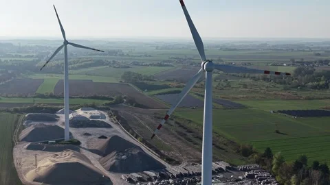 Eco friendly solar panel farm with wind generator Stock Footage 348002169